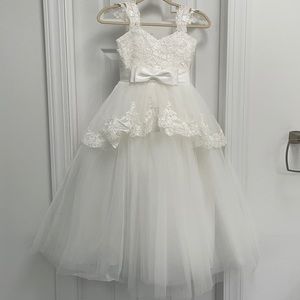 Off white ball gown style flower girl dress